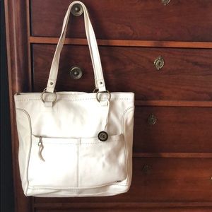 The Sak cream colored leather bag